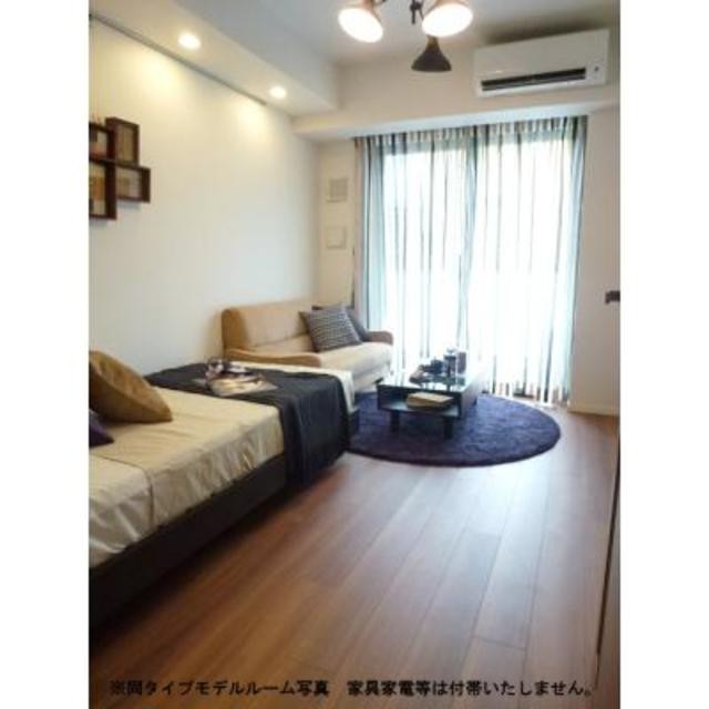 ※写真は同タイプ住戸です。(居間)