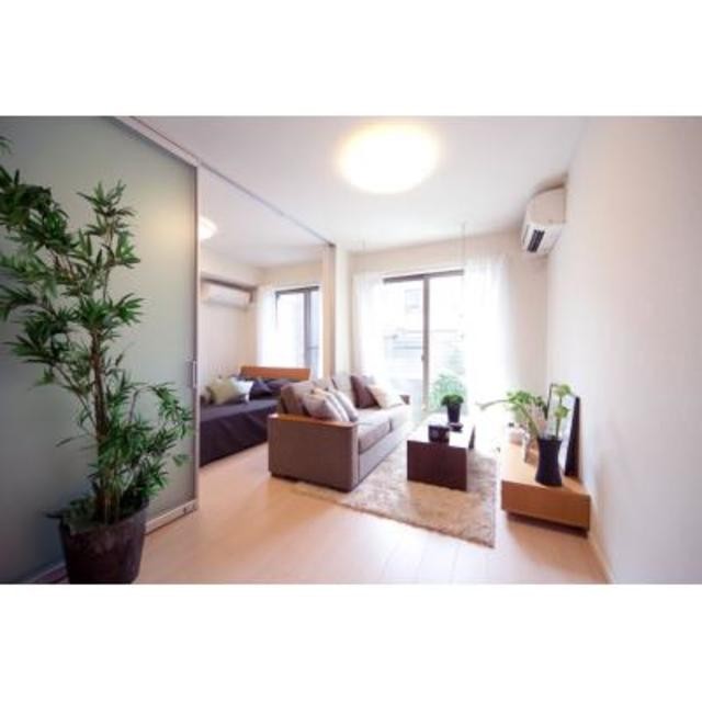 ※写真は同タイプ住戸です。(居間)