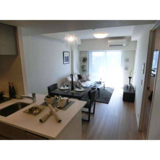 ※写真は同タイプ住戸です。(居間)