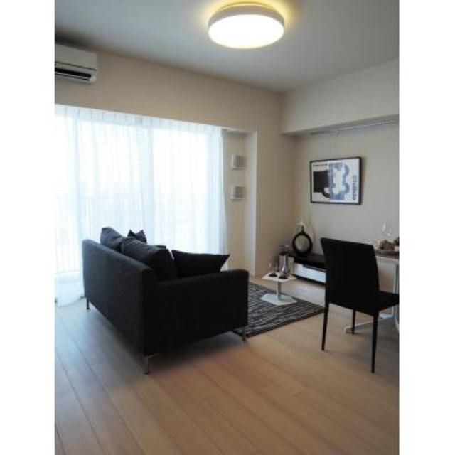 ※写真は同タイプ住戸です。(居間)