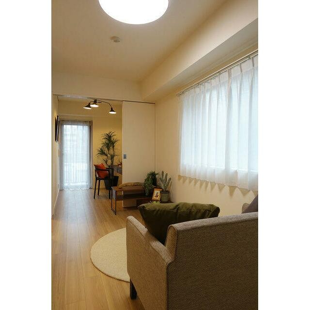 ※写真は同タイプ住戸です。(居間)