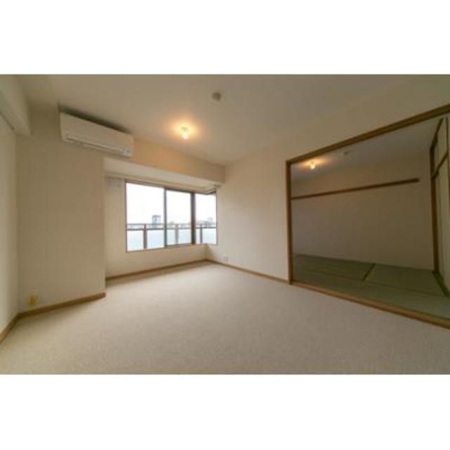 ※写真は同タイプ住戸です。(居間)